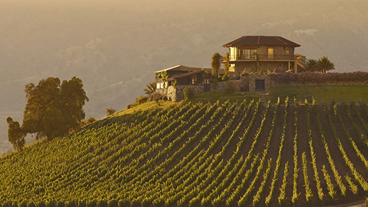 Beautiful landscape with a house on a mountain; image used for HSBC Sri Lanka Homepage