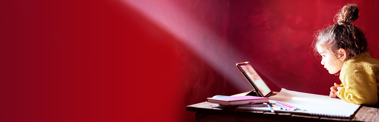 child watching tablet; image used for HSBC LK premier junior account page