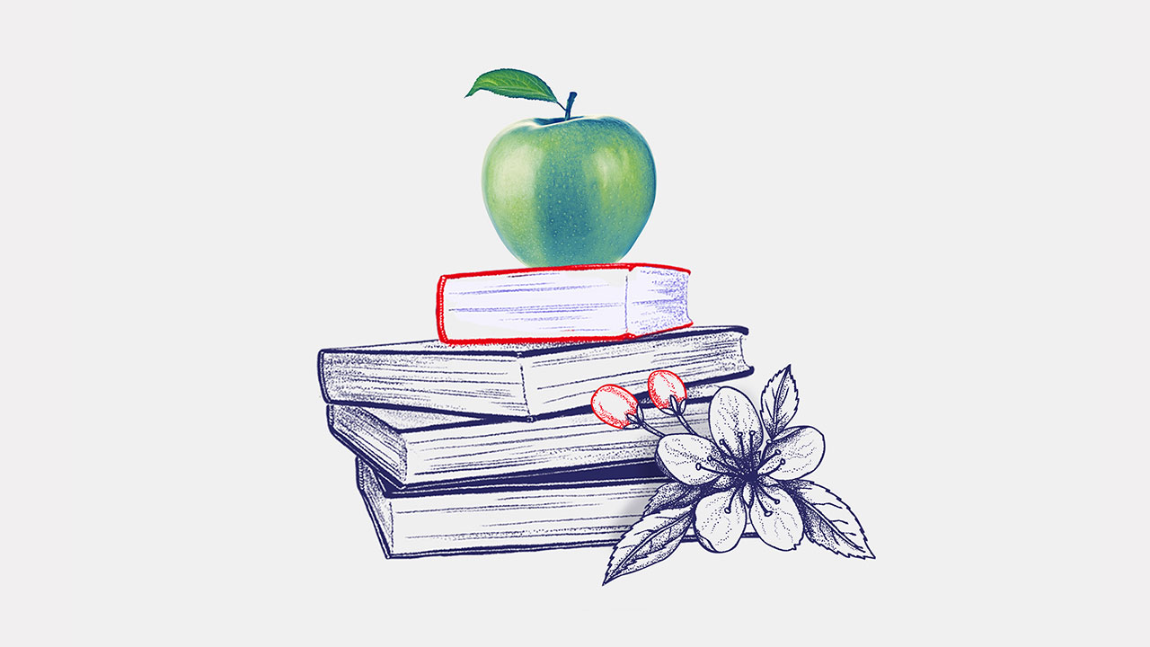 an apple on a stack of books; image used for HSBC LK studying abroad page