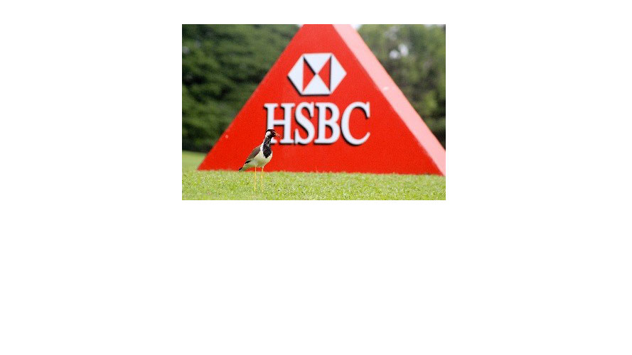 a sign with HSBC logo on the lawn